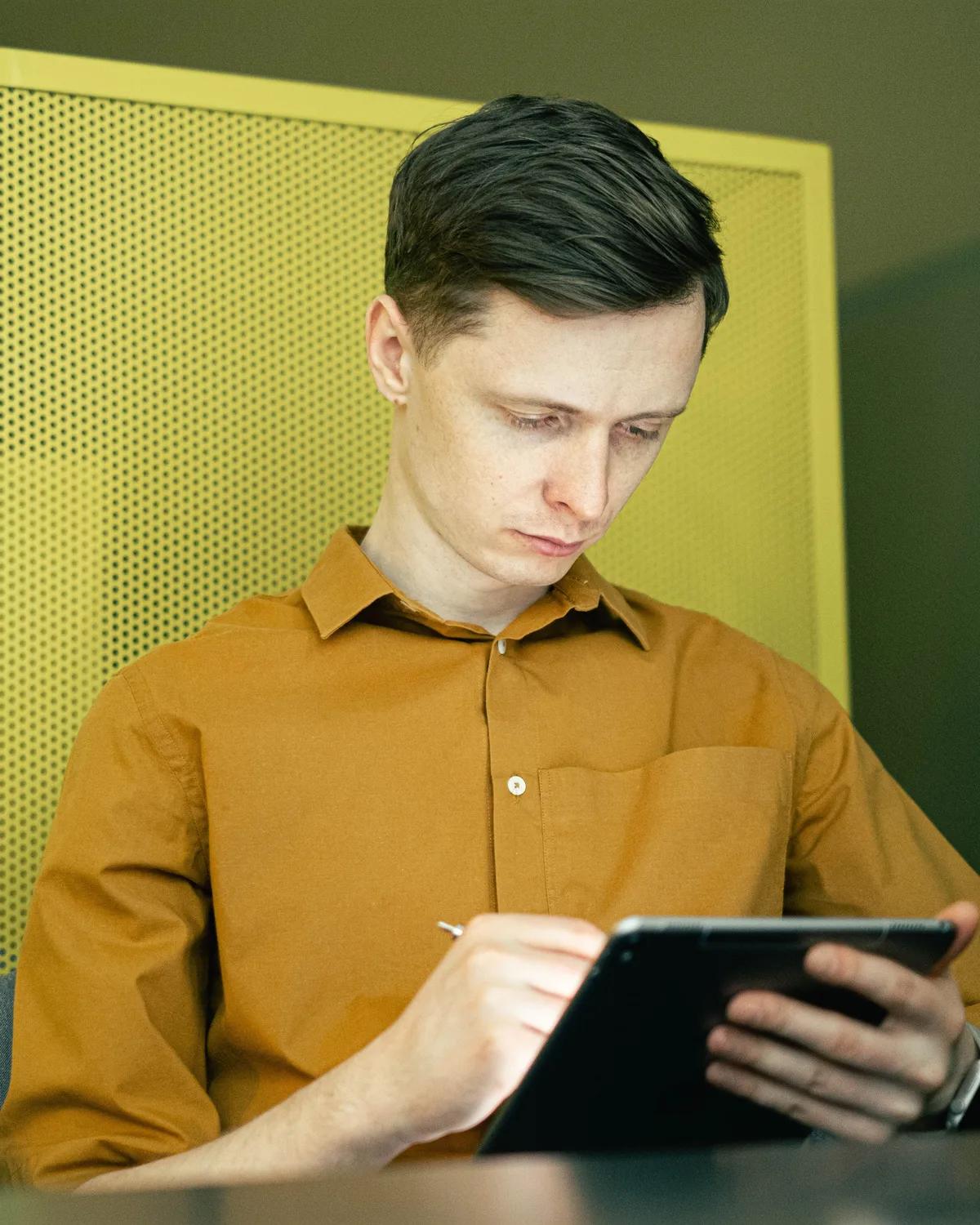 Reviewing an inventory of systems on a tablet.